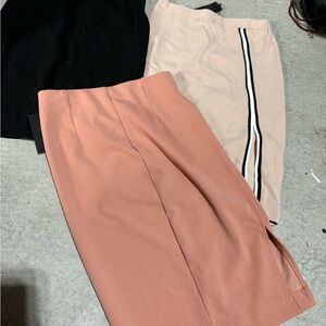 NWT bundle of three skirts with slits.  Size xs